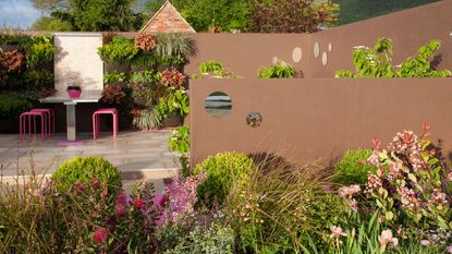 garden design with living wall, patio, walls, garden furniture and flowerbeds