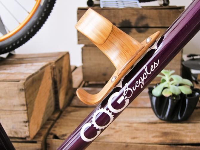 Handmade bamboo bidon cage on a Cog Bicycles frame.