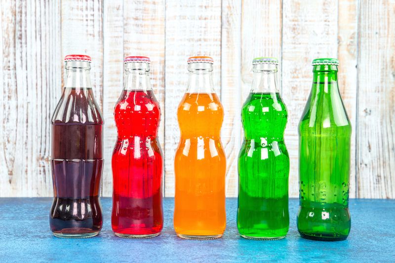 Bottles of soda and juice, in a slew of colors.