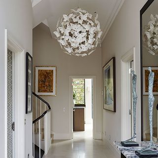 white entrance hall with staircase