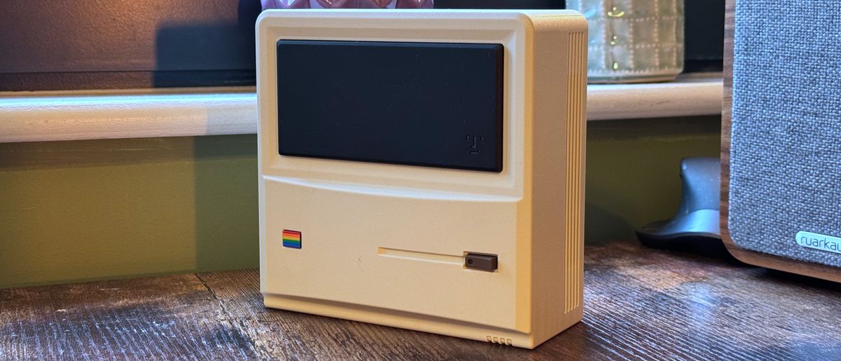 AyaNeo Retro Mini PC AM01 on a wooden home office desk