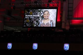 A tribute to Tiger Woods' mother, Kultida Woods appears on the screen inside TGL's SoFi Center