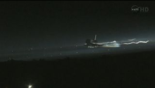Space shuttle Atlantis lands for the final time in history.