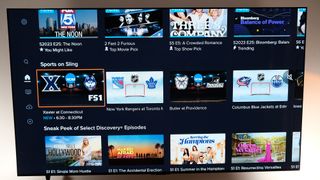 The Sports row shows college basketball and hockey on Sling TV on a wall-mounted TV