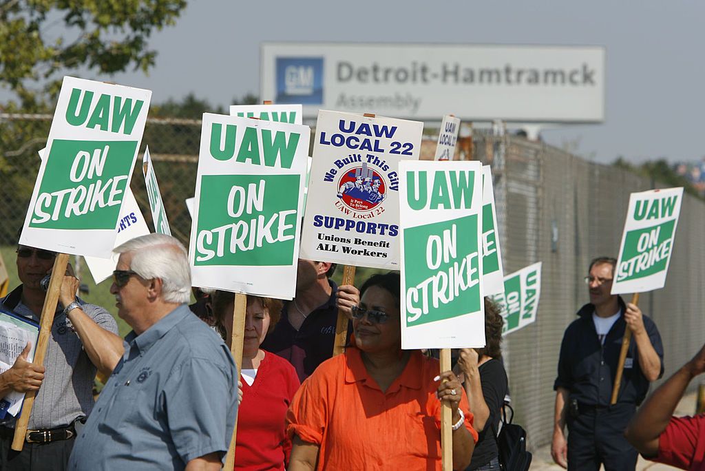 Members and supporters of UAW Local 22 picket outside the General Motors Detroit-Hamtramck Assembly Plant.