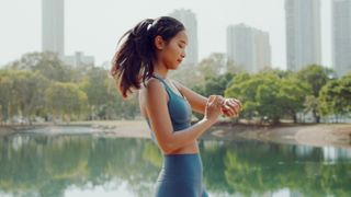 Woman using sports watch during workout