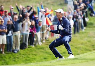 Rose celebrates a chip-in at the 2018 Ryder Cup at Le Golf National