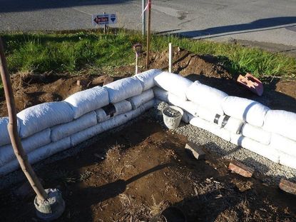 Garden With Sandbags As Walls