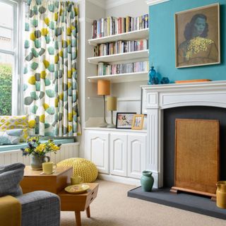 Blue living room with eclectic touches and mid century modern style curtains