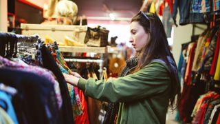 Woman shopping in London second hand marketplace