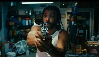 Daveed Diggs as Colin freestyles while holding a gun in Blindspotting