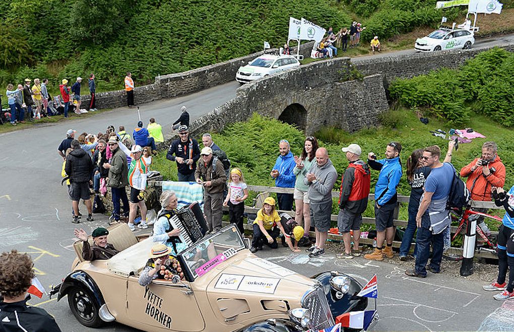 The 2014 Tour de France publicity caravan crosses the Brinton Moor bridge