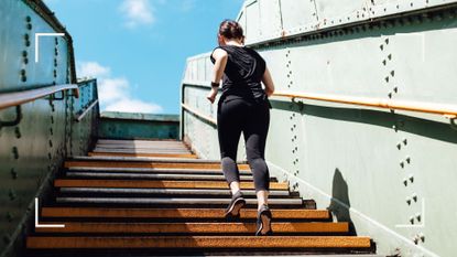 Woman running for weight loss up iron steps