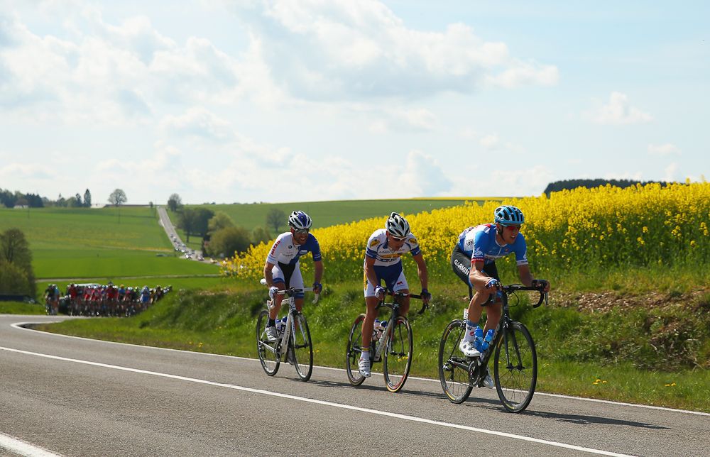 Ramunas Navardauskas (Garmin-Sharp) leads Preben Van Hecke (Topsport Vlaanderen-Baloise) and Jonny Clarke (UnitedHealthcare) in an early breakaway during the 78th edition of the La Fleche Wallonne in 2014. The 199km parcours scaled the Mur de Huy climb three times, with the final 9.3 per cent average ascent providing the finish to the race.