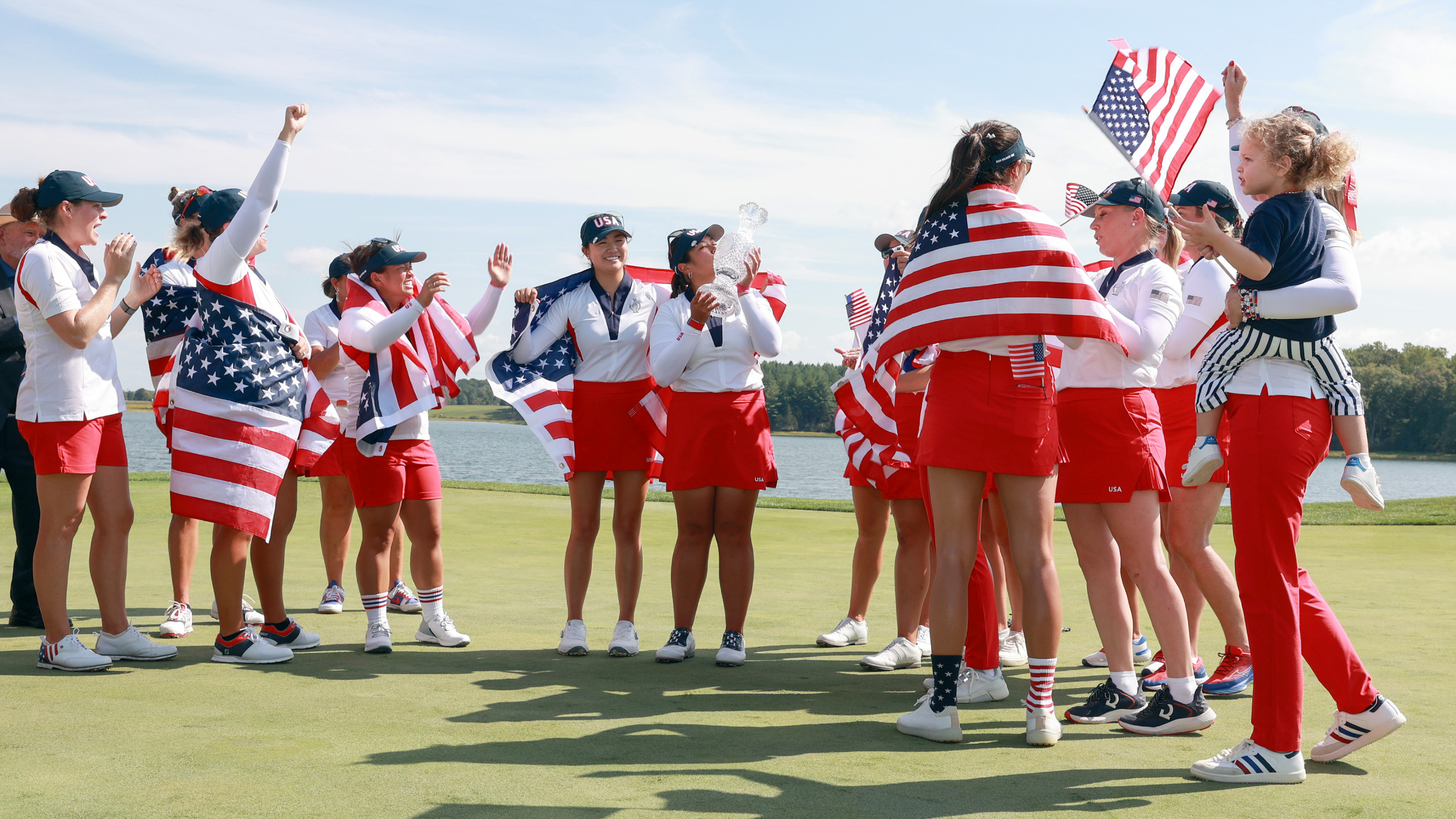 Team USA celebrate winning the Solheim Cup