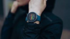 Close-up of a person wearing the Polar Pacer Pro on her wrist