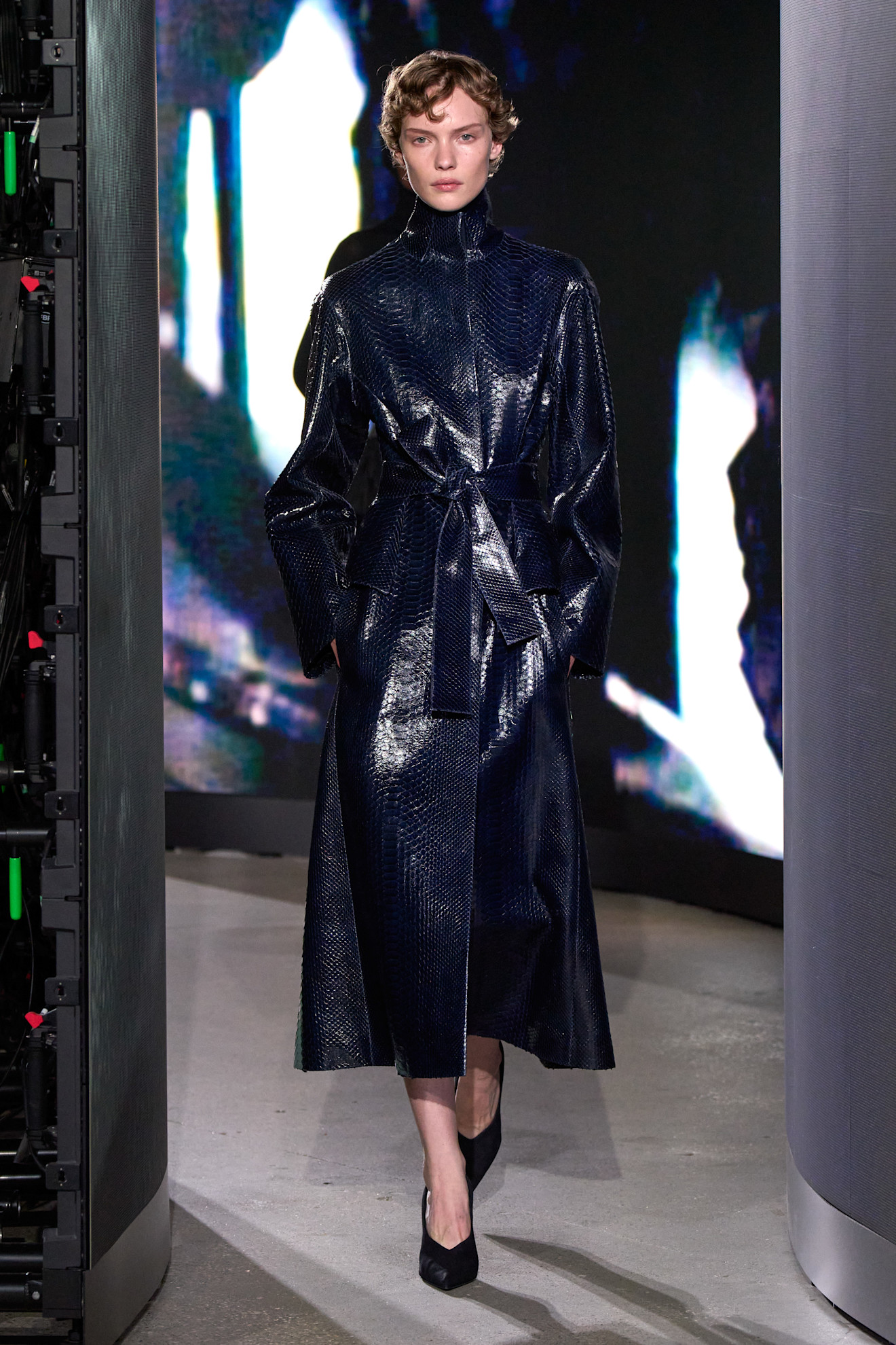 A model walking in the spring/summer 2027 Ala&amp;iuml;a show during Paris Fashion Week wearing a jewel-tone look.