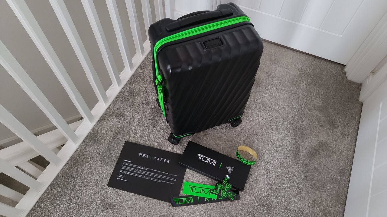 Tumi Razer International Expandable 4 Wheel Carry-On Luggage