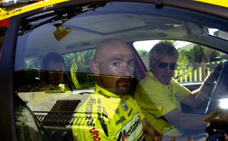 Marco Pantani in the team car after withdrawing from the 2001 Vuelta