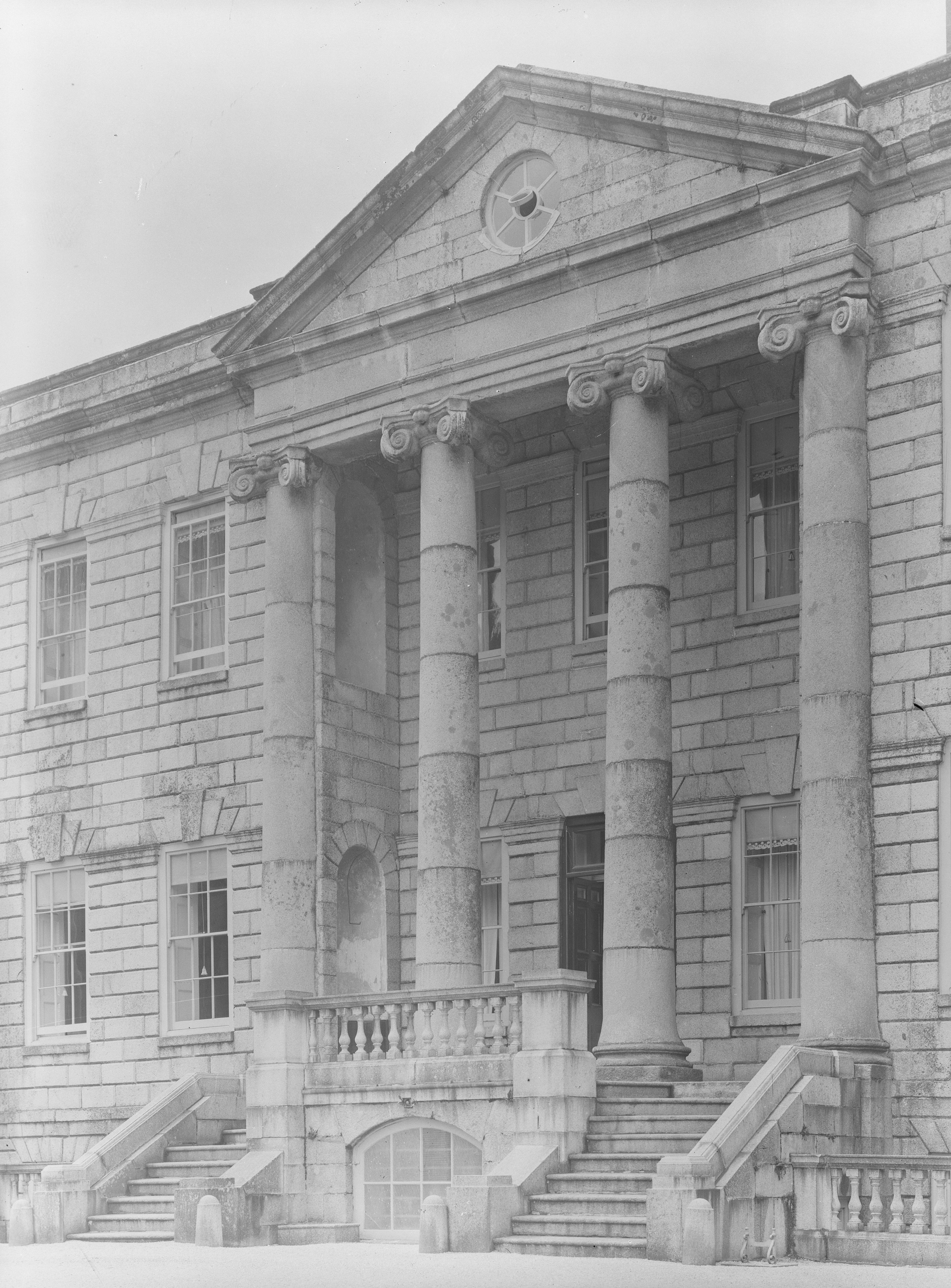 Black and white photographs or a palladian-style house