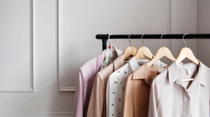 Clothes hanging neatly on a clothing rail