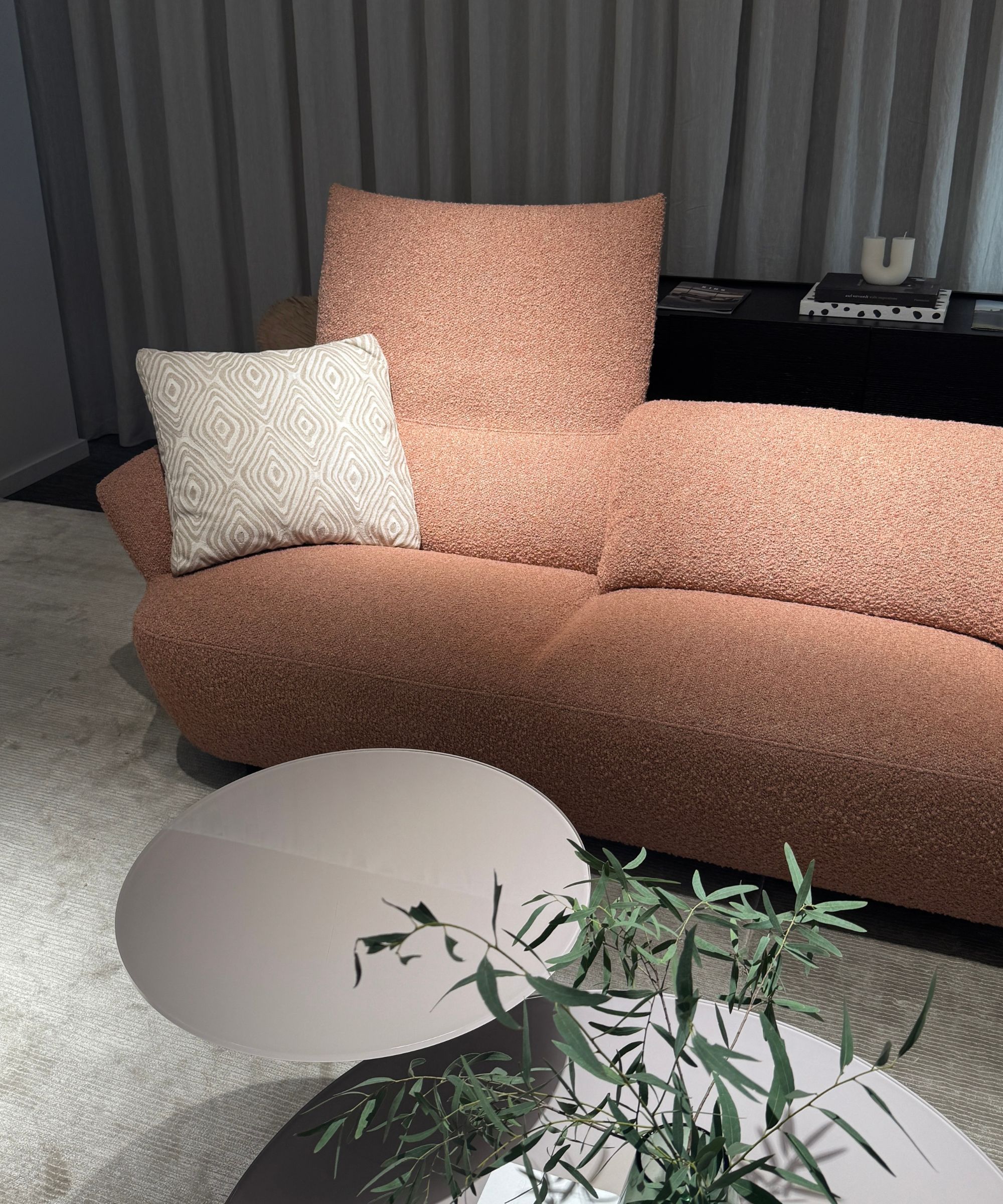 King Living Fleur Sofa in pink with nesting coffee tables and beige patterned cushion