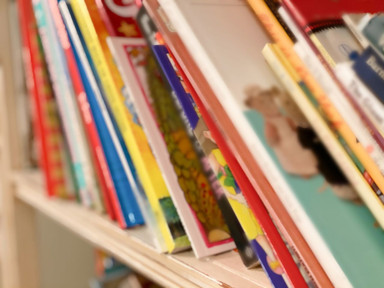 stock photo of children&amp;#039;s books on a shelf