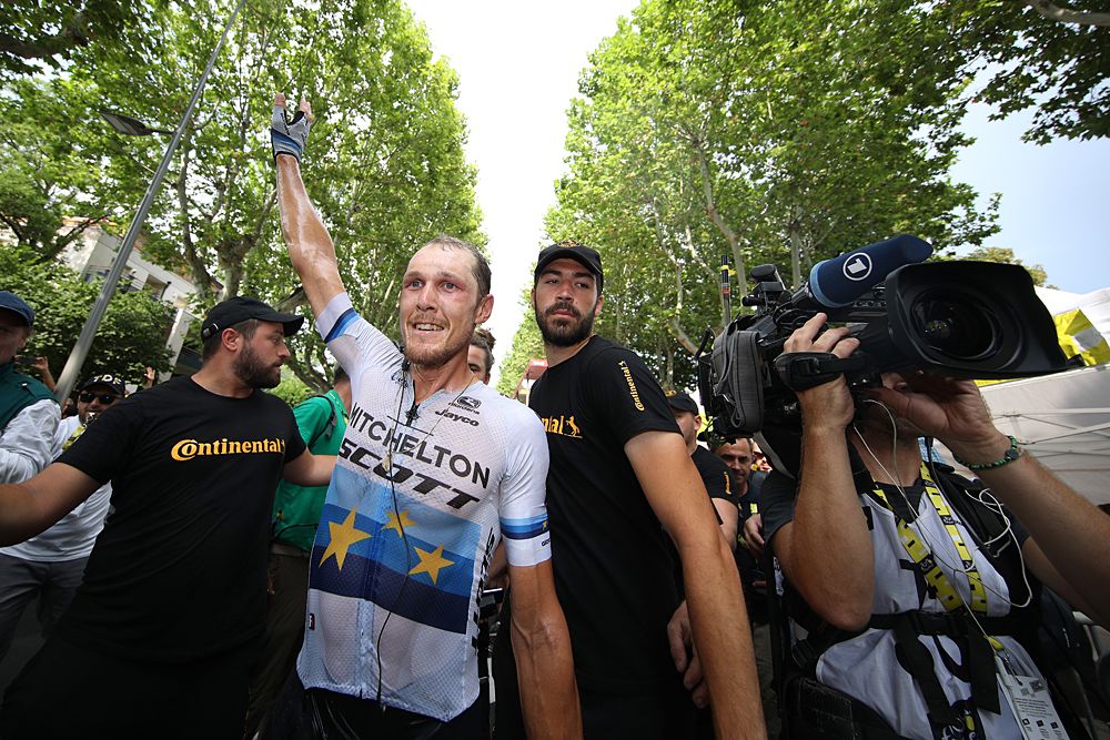 Matteo Trentin (Mitchelton-Scott) celebrates a solo victory on stage 17 at the Tour de France