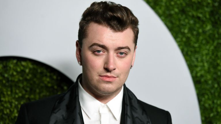 Clothing, Ear, Lip, Cheek, Coat, Hairstyle, Collar, Chin, Forehead, Eyebrow,