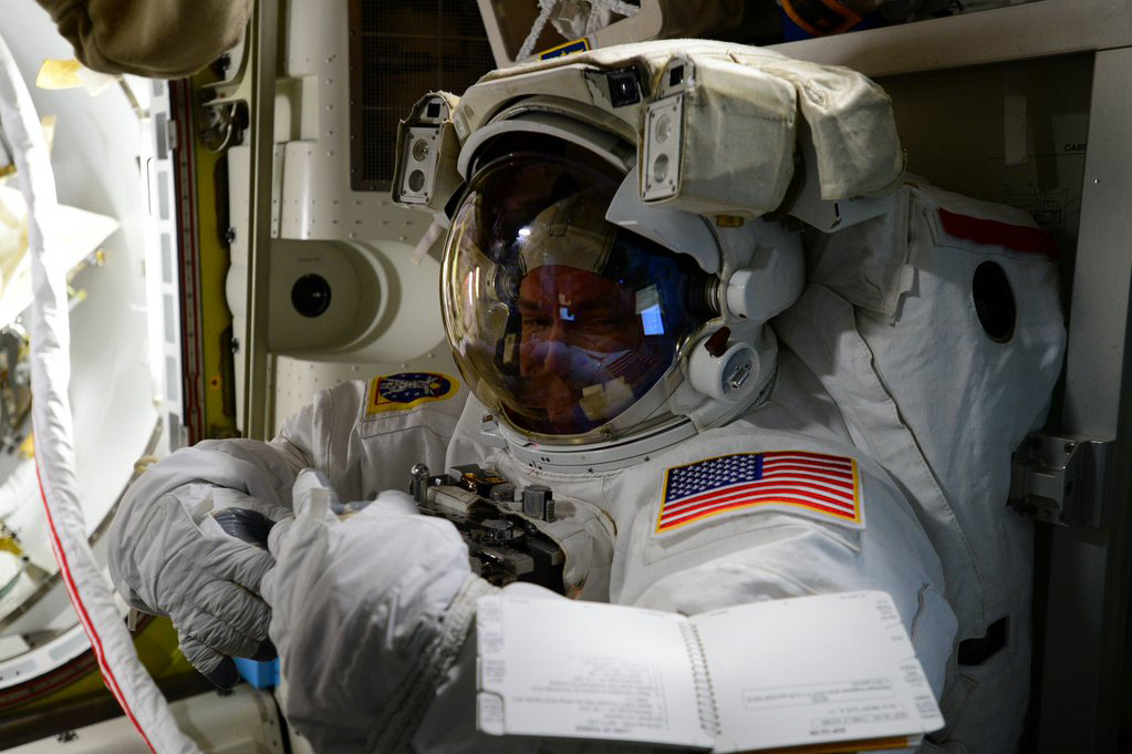 NASA astronaut Scott Kelly is seen in his NASA spacesuit on the International Space Station on Oct. 27, 2015 ahead of his first spacewalk on Oct. 28 with crewmate Kjell Lindgren, also of NASA.