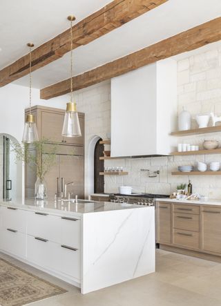 A kitchen with storage on walls