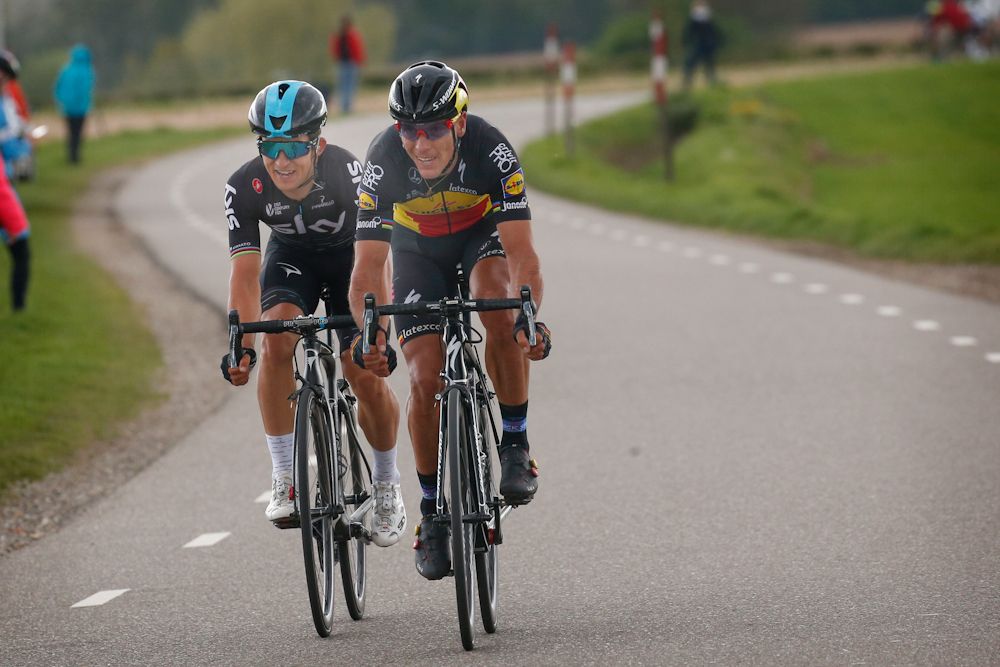 Philippe Gilbert and Michal Kwiatkowski ride toward the finish of the Amstel Gold Race