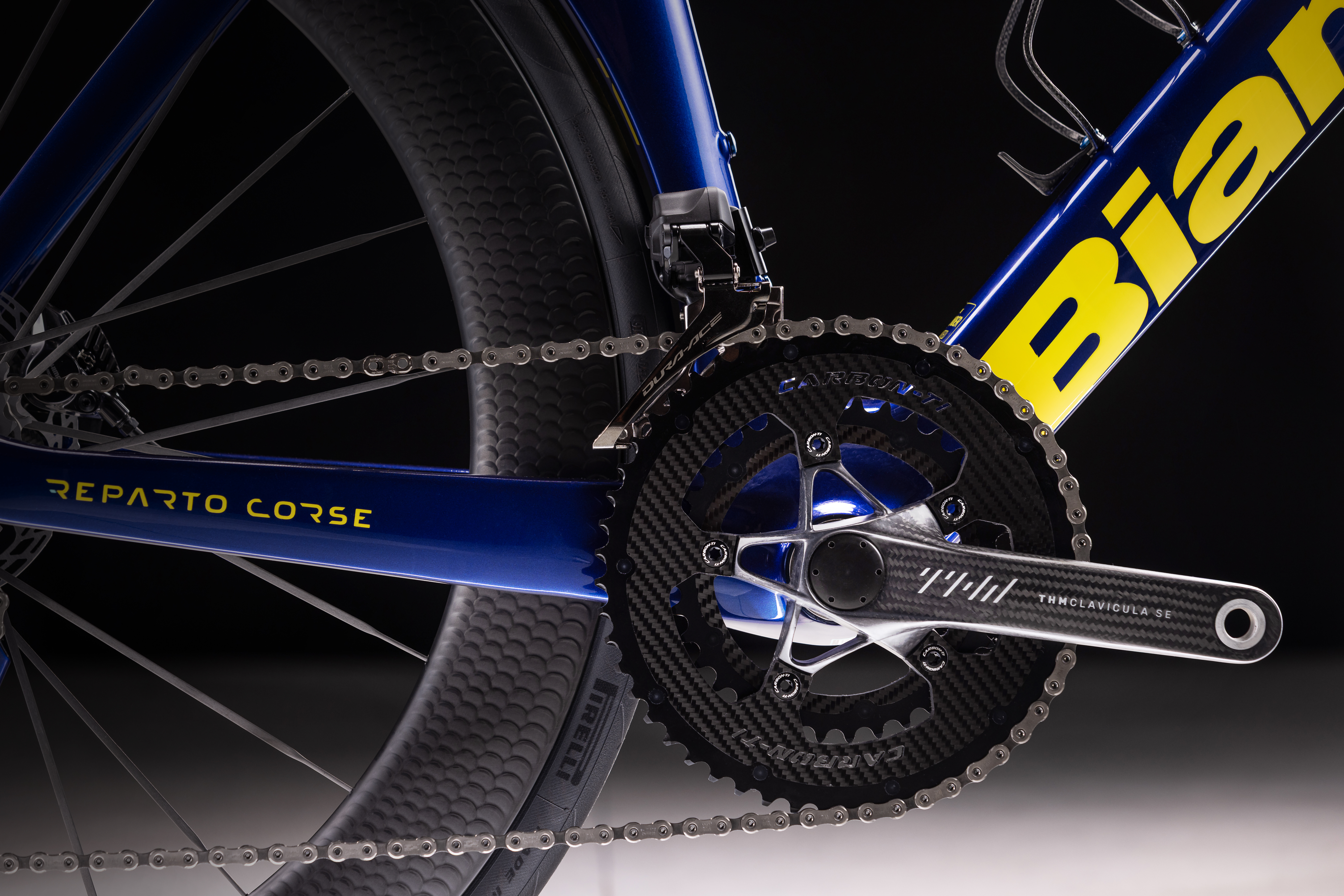 studio beauty shots of Bianchi road racing bike shown against black