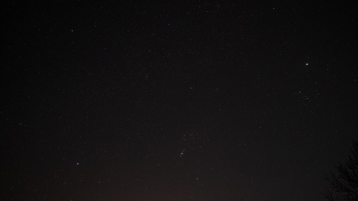 The night sky showing Sirius, Orion and Jupiter.