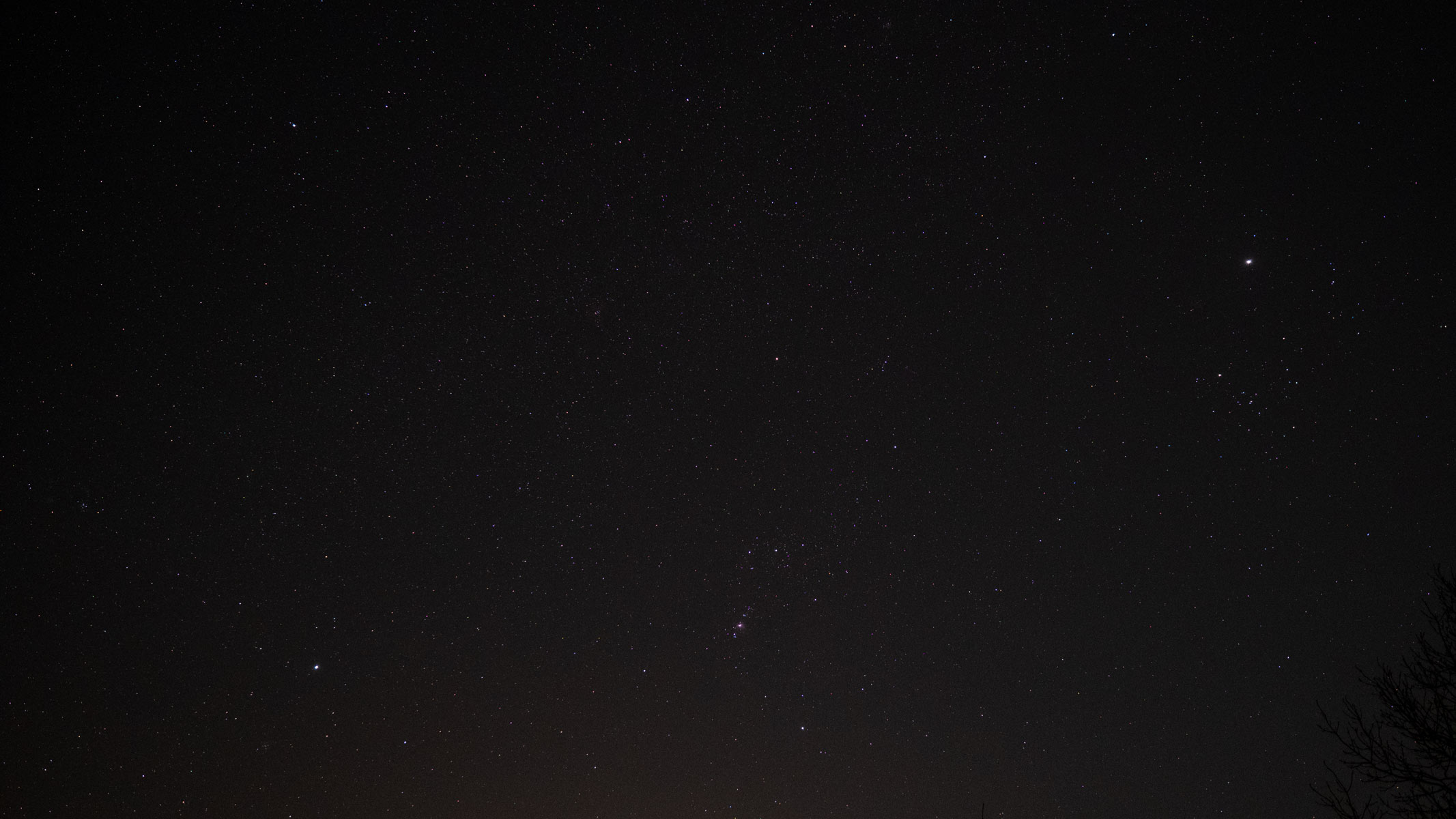 The night sky showing Sirius, Orion and Jupiter