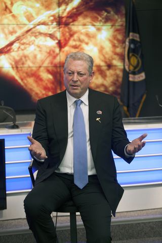Former Vice President Al Gore speaks to reporters at NASA's Kennedy Space Center in Florida during the first launch attempt of the Deep Space Climate Observatory on Feb. 8, 2015. The space weather satellite launched on Feb. 11, a sight that Gore said it was "inspiring to witness" after 17 years of waiting for the mission.