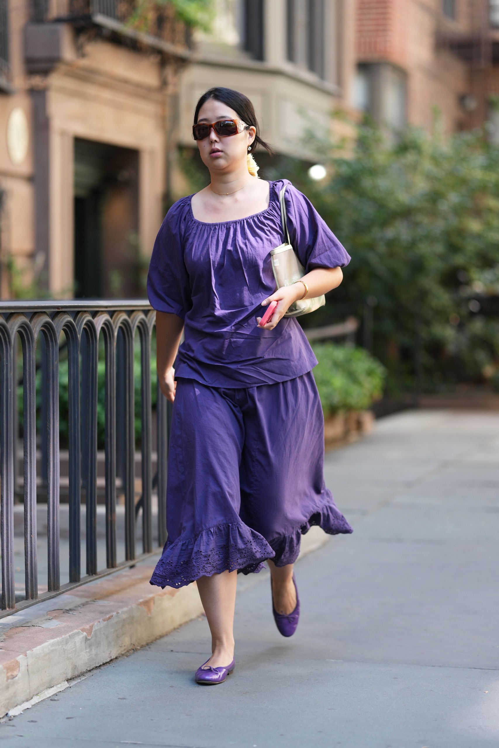 A New York girl wearing the colorful ballet flat trend at New York Fashion Week
