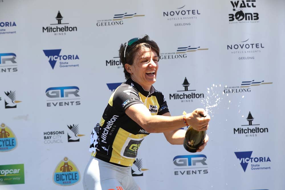Valentina Scandolara in the yellow and black overall winner's jersey
