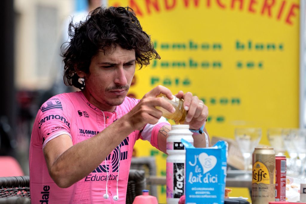 Australian cyclist Lachlan Morton takes a break during the 13th day of his solo alternative Tour de France cycling race in TarasconsurAriege on July 8 2021 Lachlan Morton is riding every kilometer of the Tour de France plus the distances between race starts and finishes solo He stops at cafes for his food and sleep under the stars at night Morton is racing to raise money for World Bicycle Relief Photo by VALENTINE CHAPUIS AFP Photo by VALENTINE CHAPUISAFP via Getty Images