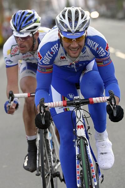 Tom Boonen (Quick Step) and Jimmy Engoulvent (Saur - Sojasun) try to hold off the peloton in the final kilometres.