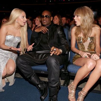 Clothing, Hair, Face, Leg, Event, Trousers, Dress, Outerwear, Thigh, Fashion accessory,