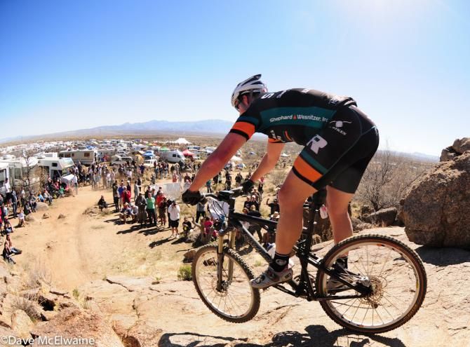 A racer descends slickrock at the 24 Hours of the Old Pueblo near Tucson Arizona. Epic weekends of racing like this are growing in popularity in the USA.