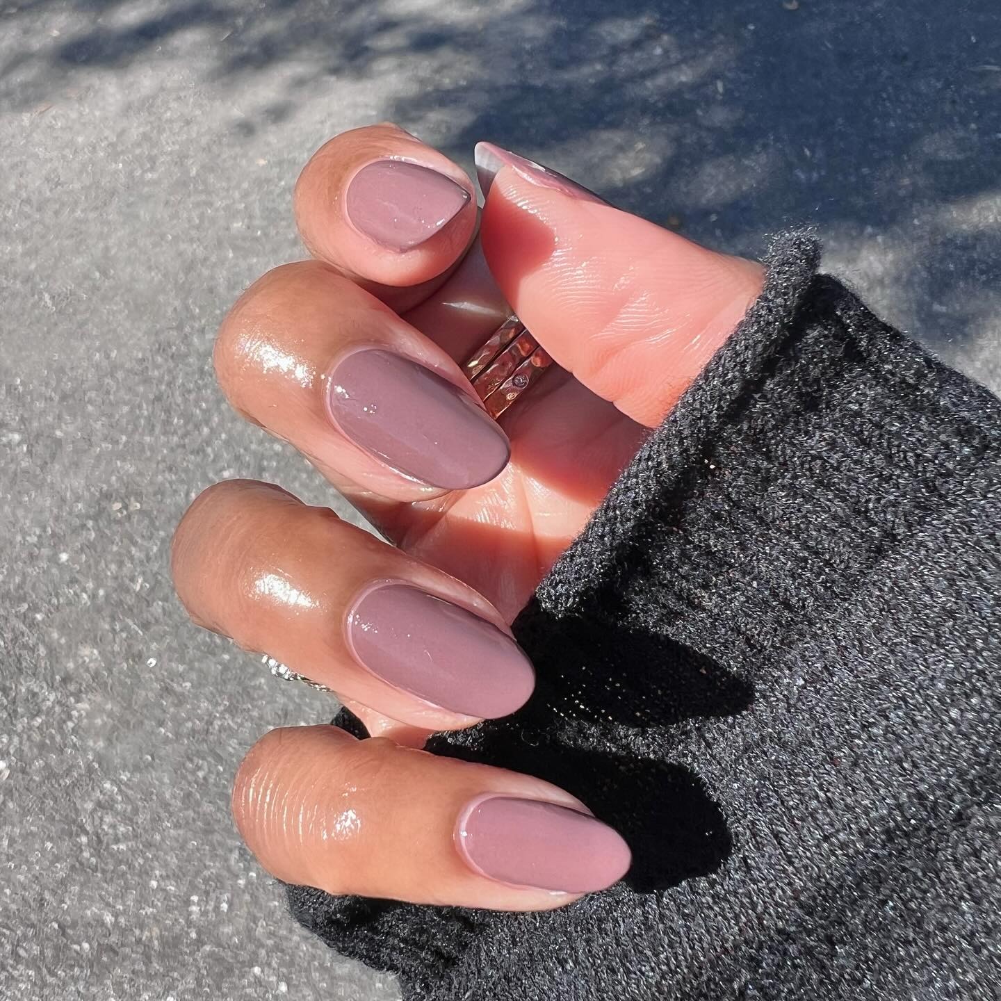 Muted mauve nails.