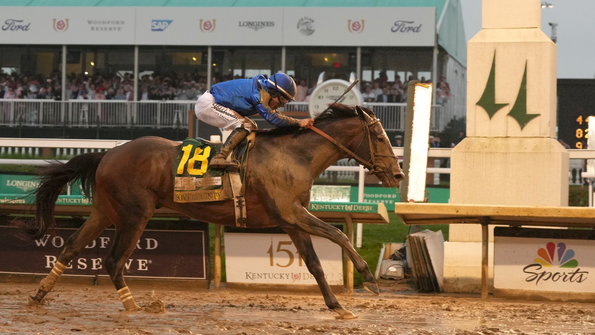 Sovereignty #18, ridden by jockey Junior Alvarado crosses the finish line to win the 151st running of the Kentucky Derby