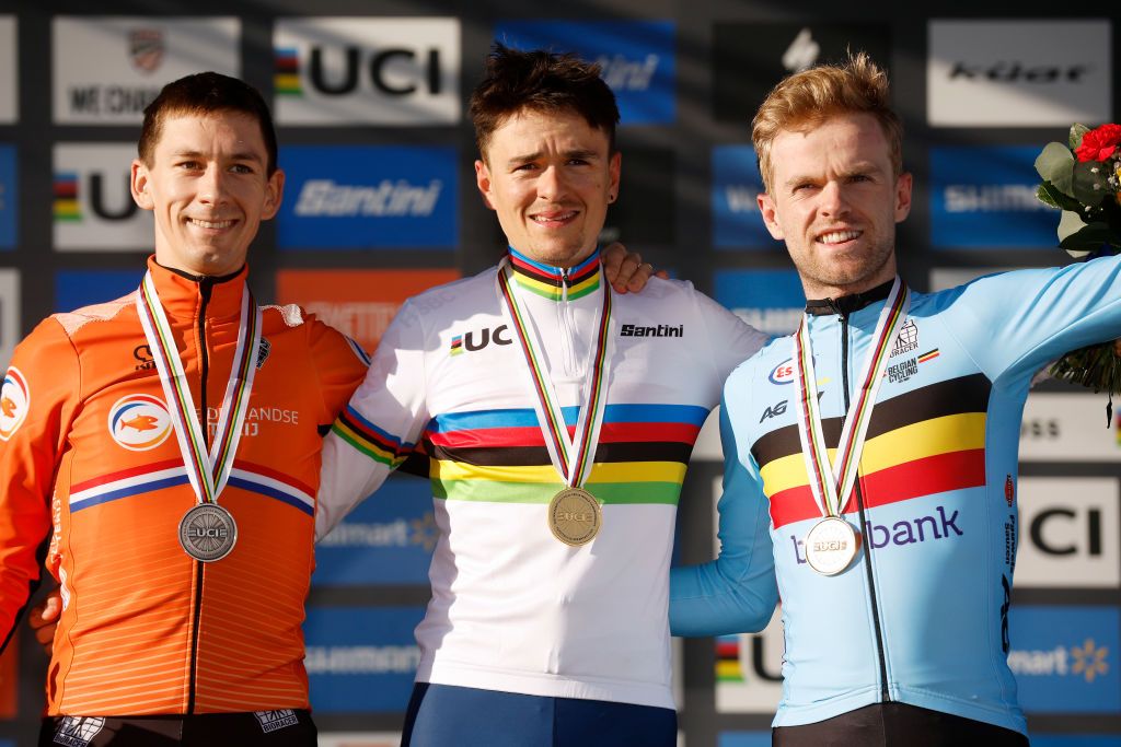 FAYETTEVILLE ARKANSAS JANUARY 30 LR Silver medalists Lars Van Der Haar of Netherlands gold medalists Thomas Pidcock of The United Kingdom and bronze medalists Eli Iserbyt of Belgium pose on the podium during the medal ceremony after the 73rd UCI CycloCross World Championships Fayetteville 2022 Mens Elite Fayetteville2022 on January 30 2022 in Fayetteville Arkansas Photo by Chris GraythenGetty Images