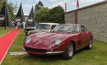 Classic cars, including a Ferrari 275 GTB