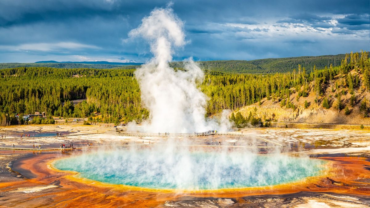 Watch hikers risk lives strolling beside giant hot spring at ...