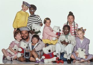 Oliviero Toscani with children during a Benetton campaign