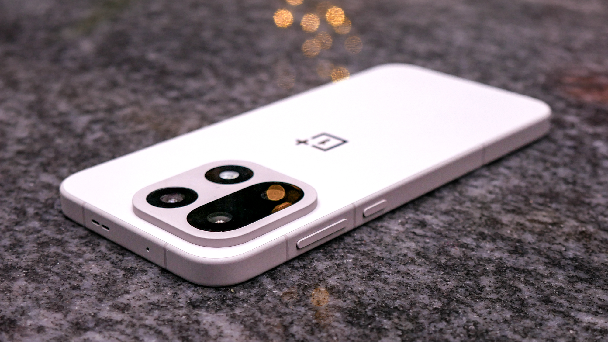 OnePlus 15 laid on flat surface.