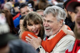 Taylor Swift hugs Ed Kielce after the AFC Championship NFL football game between the Kansas City Chiefs and Baltimore Ravens at M&T Bank Stadium on January 28, 2024 in Baltimore, Maryland.